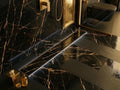 Sleek matte black tile insert floor drain for invisible shower drainage look, MHT PAK.