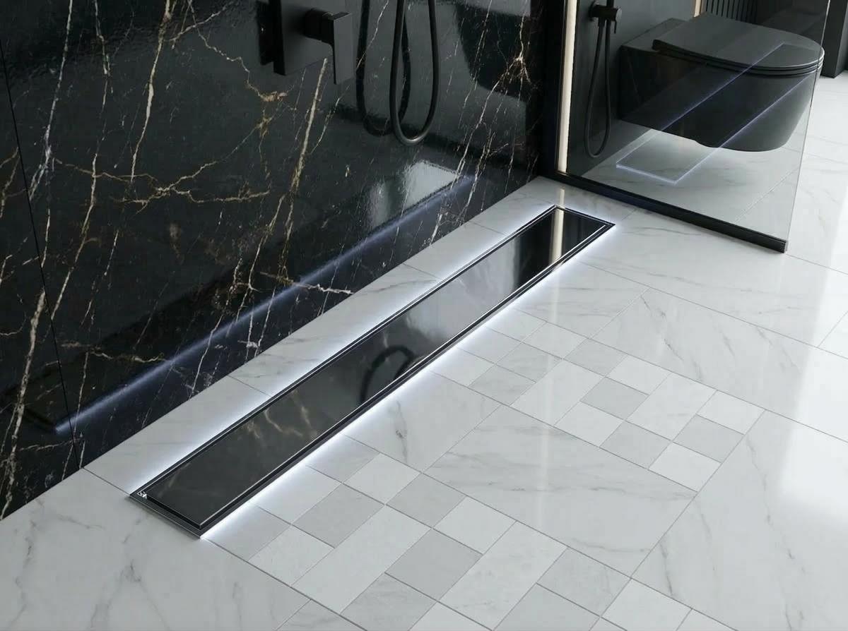 Modern invisible stainless steel tile insert flow drain in polished silver rim finish, MHT PAK.