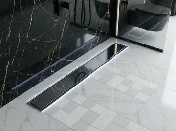 Modern invisible stainless steel tile insert flow drain in polished silver rim finish, MHT PAK.